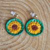 boucles d'oreilles vertes tournesol, cuir végétal, l'âge du cuir, maroquinerie artisanale, dordogne, france
