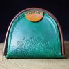 porte-monnaie fer à cheval vert et marron mandala, l'âge du cuir, maroquinerie artisanale, Dordogne, France