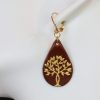 boucle d oreille arbre de vie doré marron, tannage végétal, l'âge du cuir, maroquinerie artisanale éthique et responsable, dordogne, france
