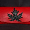 etui a lunette rouge feuille noire, tannage végétal, l'âge du cuir, maroquinerie artisanale éthique et responsable, dordogne, france