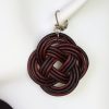 boucle d oreille nœud aubergine, tannage végétal, teintures naturelles l'âge du cuir, maroquinerie artisanale éthique et responsable, dordogne, france