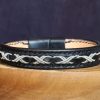 bracelet viking, cuir tressé, sami, tannage végétal, noir et argent, maroquinerie artisanale éthique et responsable, Dordogne, France